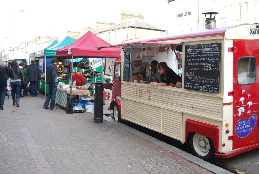 Northcote Road Market, a Battersea street market on a busy shopping road, with groceries, charcuterie and artisan stalls