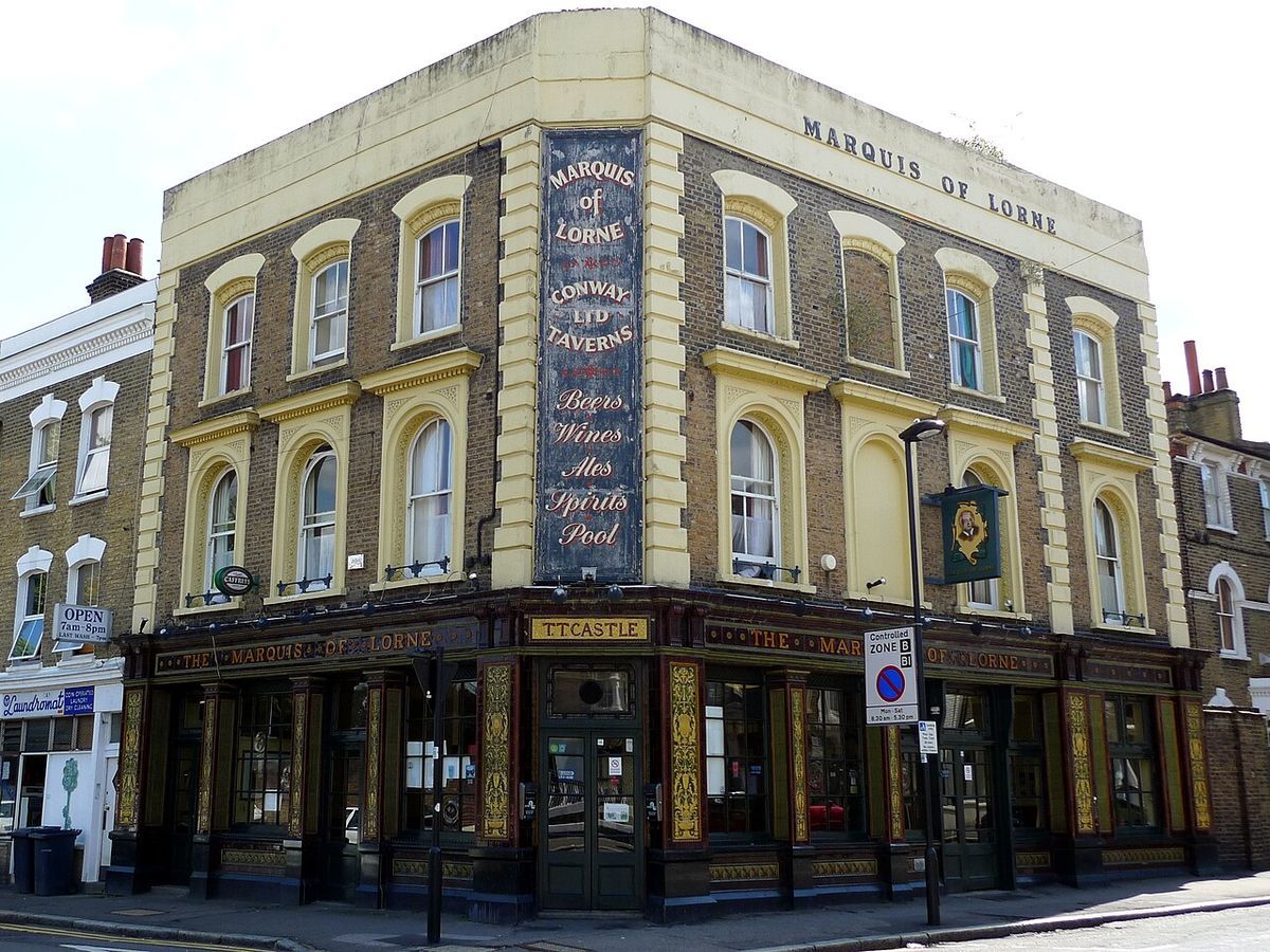 The Marquis of Lorne, a Grade II listed Victorian corner pub in Stockwell wrapped in gold, jade and brown glazed tiles